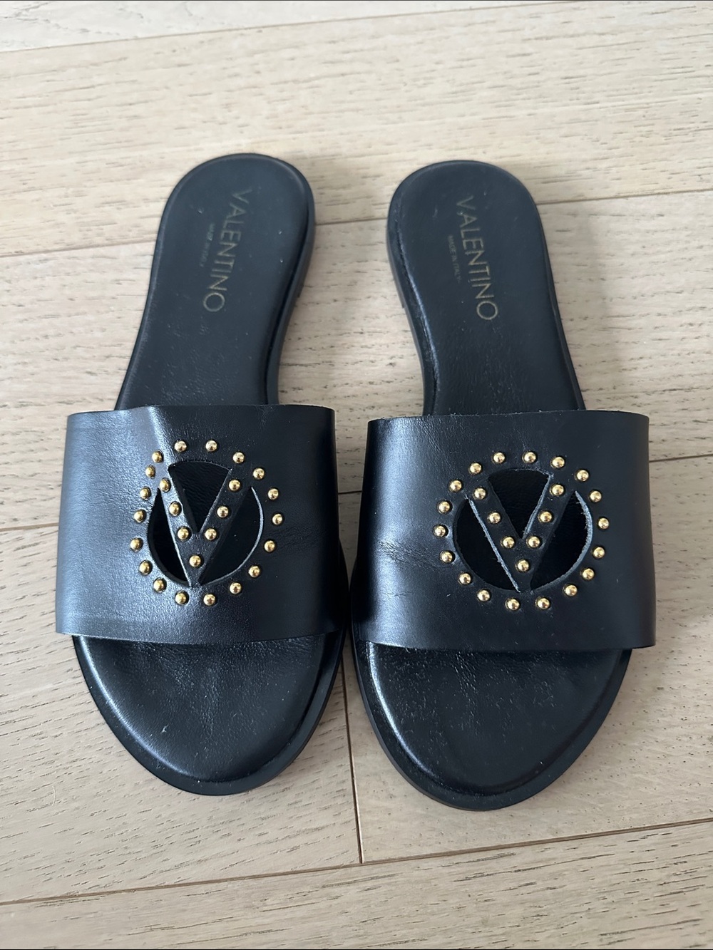 Valentino Black Leather Slide Sandals with Gold Stud Logo